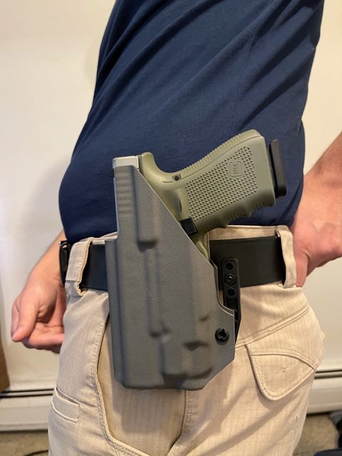 Carrying IWB holster OWB